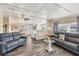 Comfortable living room with gray sofas and wood floors at 1532 46Th Avenue E Dr, Ellenton, FL 34222