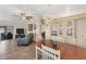 Spacious living room featuring gray couches and wood floors at 1532 46Th Avenue E Dr, Ellenton, FL 34222