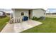 Large concrete patio with ample space for storage at 1532 46Th Avenue E Dr, Ellenton, FL 34222