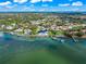 Community waterfront view with various houses and docks at 443 Picasso Dr, Nokomis, FL 34275