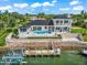 Luxury waterfront home with pool, dock, and stunning views at 443 Picasso Dr, Nokomis, FL 34275
