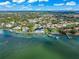 Community waterfront view with various houses and docks at 443 Picasso Dr, Nokomis, FL 34275