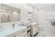 Bathroom with double vanity, glass shower, and tiled floors at 443 Picasso Dr, Nokomis, FL 34275