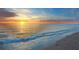 Scenic sunset over the ocean and sandy beach at 443 Picasso Dr, Nokomis, FL 34275