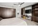 Bright bedroom featuring a built-in workspace and ample closet space at 443 Picasso Dr, Nokomis, FL 34275