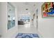 Elegant entryway offering views to living room and water at 443 Picasso Dr, Nokomis, FL 34275