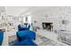 Cozy living room featuring a fireplace and comfortable seating at 443 Picasso Dr, Nokomis, FL 34275