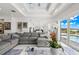 Open living space with water views and access to pool area at 443 Picasso Dr, Nokomis, FL 34275