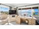 Office with water views, built-in cabinetry, and comfortable seating at 443 Picasso Dr, Nokomis, FL 34275