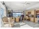 Bright office with water views, built-in cabinetry, and comfortable seating at 443 Picasso Dr, Nokomis, FL 34275