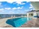 Relaxing swimming pool with spacious patio and water views at 443 Picasso Dr, Nokomis, FL 34275