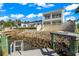 Private dock and waterfront access from backyard at 443 Picasso Dr, Nokomis, FL 34275