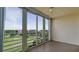 Enjoy serene views from this spacious tiled patio with large glass windows at 4410 Fairways Blvd # 505, Bradenton, FL 34209