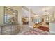 Bright and spacious entryway with decorative accents and views into the living areas at 2909 Old Orchard Ln, Parrish, FL 34219