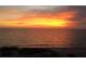 Vibrant sunset over the ocean and beach at 3710 Gulf Of Mexico Dr # E3, Longboat Key, FL 34228