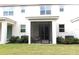 Private screened patio and fenced-in backyard with lush landscaping at 11936 Sky Acres Ter, Bradenton, FL 34211