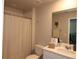 Bathroom with shower/tub combo, single vanity, and neutral decor at 11936 Sky Acres Ter, Bradenton, FL 34211