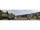 Residential street view with parked cars and homes at 11936 Sky Acres Ter, Bradenton, FL 34211