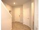 Bright entryway with tile flooring and stairs at 11936 Sky Acres Ter, Bradenton, FL 34211