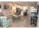 Open living room showcasing a spacious layout, modern furniture, and ample natural light at 11936 Sky Acres Ter, Bradenton, FL 34211