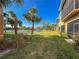 Landscaped backyard with pond and lush vegetation at 7317 Skybird Rd # 7317, Bradenton, FL 34209