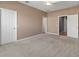 Spacious bedroom with neutral walls and carpeted floors at 7317 Skybird Rd # 7317, Bradenton, FL 34209