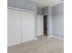 Bedroom with double doors and closet at 7317 Skybird Rd # 7317, Bradenton, FL 34209