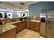 Community kitchen with stainless steel appliances and granite counters at 7317 Skybird Rd # 7317, Bradenton, FL 34209