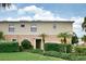 Townhouse exterior with landscaping and a green lawn at 7317 Skybird Rd # 7317, Bradenton, FL 34209