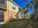 Tan building exterior with palm trees and green lawn at 7317 Skybird Rd # 7317, Bradenton, FL 34209