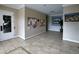 Community building lobby with tile floors and a notice board at 7317 Skybird Rd # 7317, Bradenton, FL 34209