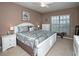 Bright main bedroom with king-size bed and ample closet space at 7317 Skybird Rd # 7317, Bradenton, FL 34209