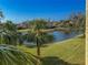 Lovely water view with palm trees and nearby homes at 7317 Skybird Rd # 7317, Bradenton, FL 34209