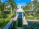 Private boat dock with charming gazebo and lush landscaping at 4415 Barracuda Dr, Bradenton, FL 34208