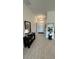 Bright and spacious entryway with tile flooring and a console table at 2665 Ensenada Ln, North Port, FL 34286