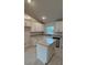 Spacious kitchen featuring a large island and white cabinetry at 2665 Ensenada Ln, North Port, FL 34286