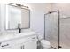 Clean bathroom with white vanity and frameless shower at 5061 Collingswood Blvd, Port Charlotte, FL 33948