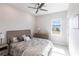 Spacious bedroom with a dresser and large window at 5061 Collingswood Blvd, Port Charlotte, FL 33948
