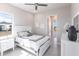Bright bedroom with white furniture and access to private bathroom at 5061 Collingswood Blvd, Port Charlotte, FL 33948