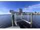 Solar powered boat lift on private dock at 5061 Collingswood Blvd, Port Charlotte, FL 33948