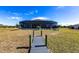 Private walkway leading to the waterfront dock at 5061 Collingswood Blvd, Port Charlotte, FL 33948