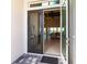Front entry with double doors opening to living room at 5061 Collingswood Blvd, Port Charlotte, FL 33948