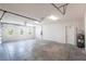 Spacious garage with two garage doors and extra space at 5061 Collingswood Blvd, Port Charlotte, FL 33948