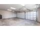 Large garage with double doors and overhead lighting at 5061 Collingswood Blvd, Port Charlotte, FL 33948