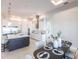 Modern kitchen featuring a large island and stainless steel appliances at 5061 Collingswood Blvd, Port Charlotte, FL 33948