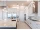 Modern kitchen with stainless steel appliances and large island at 5061 Collingswood Blvd, Port Charlotte, FL 33948