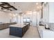 Modern kitchen with stainless steel appliances and large island at 5061 Collingswood Blvd, Port Charlotte, FL 33948