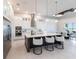 Modern kitchen with stainless steel appliances and large island at 5061 Collingswood Blvd, Port Charlotte, FL 33948