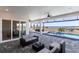Relaxing pool and spa with water views; covered lanai with outdoor seating at 5061 Collingswood Blvd, Port Charlotte, FL 33948