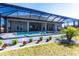 Relaxing pool and patio area with screened enclosure at 5061 Collingswood Blvd, Port Charlotte, FL 33948